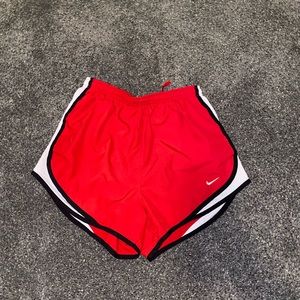 Red nike shorts